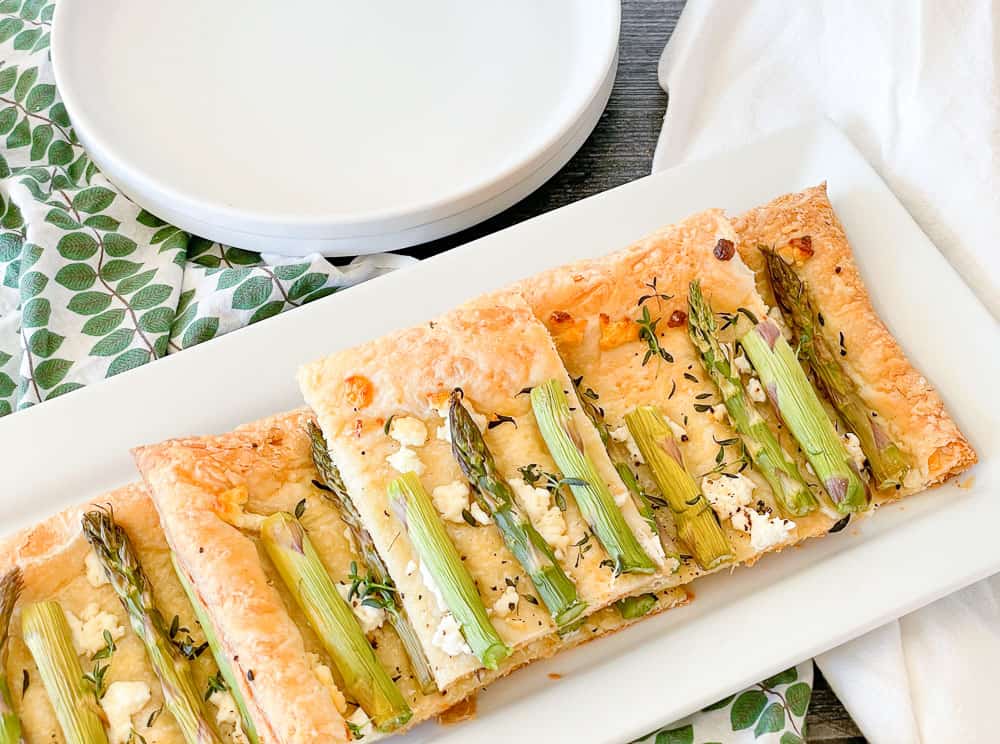 Fresh asparagus tart on a plate.