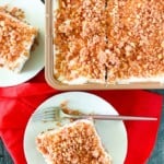 Strawberry crunch cake on plates and in the pan.