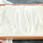 Cake frosted with cool whip.