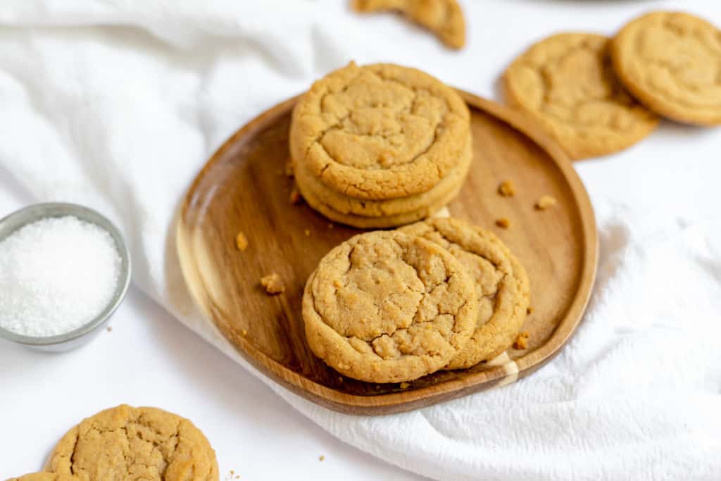 Wooden platter with biscoff cookies on it.