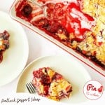 A baking dish and plate with servings of cherry dump cake, featuring a golden crust and visible cherry dump cake filling, with a serving spoon and recipe text overlay.