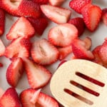 Cut strawberries in a 9x13 pan.