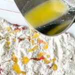 Melted butter poured over a yellow cake mix.