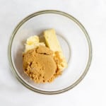 Butter and sugar mixed in a bowl.