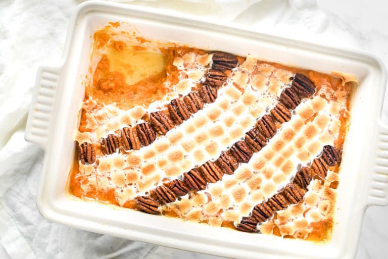 A pan of marshmallow topped sweet potato casserole.