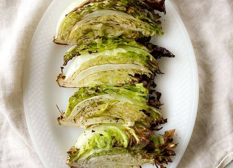 AIr Fryer Cabbage on a white platter. 