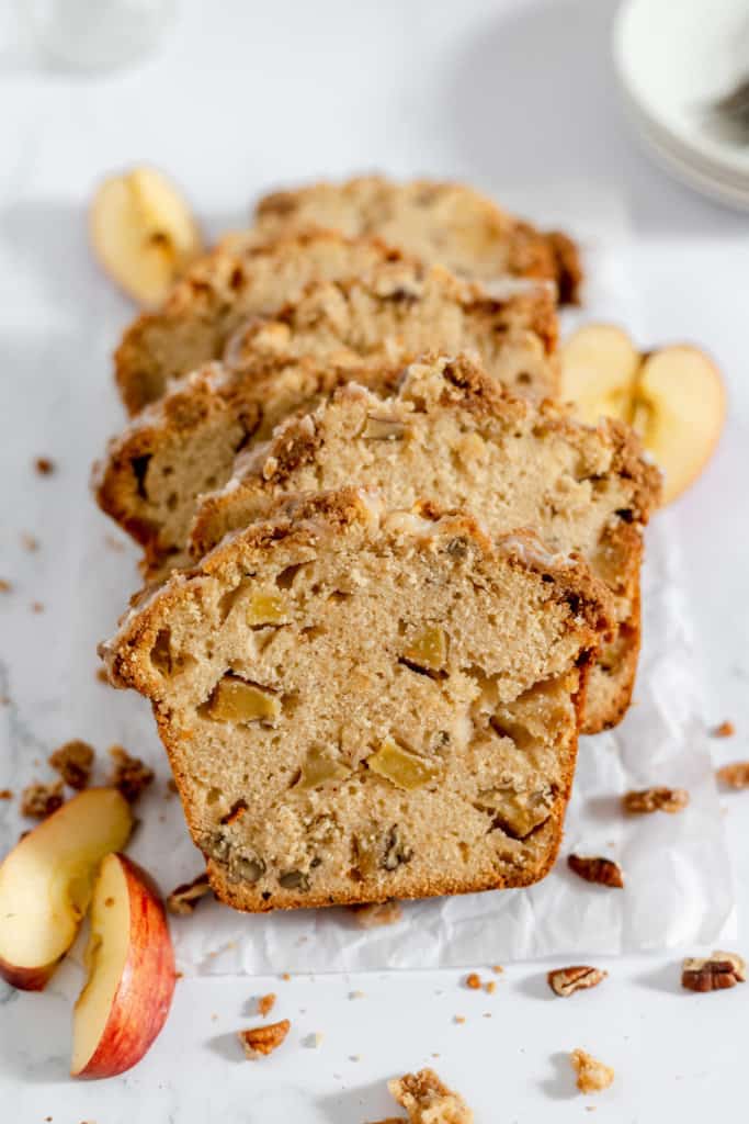 Dutch Apple Bread sliced with apple wedges.