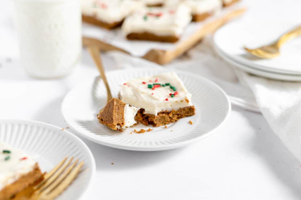 Christmas cookie gingerbread bars with colored sprinkles on top.
