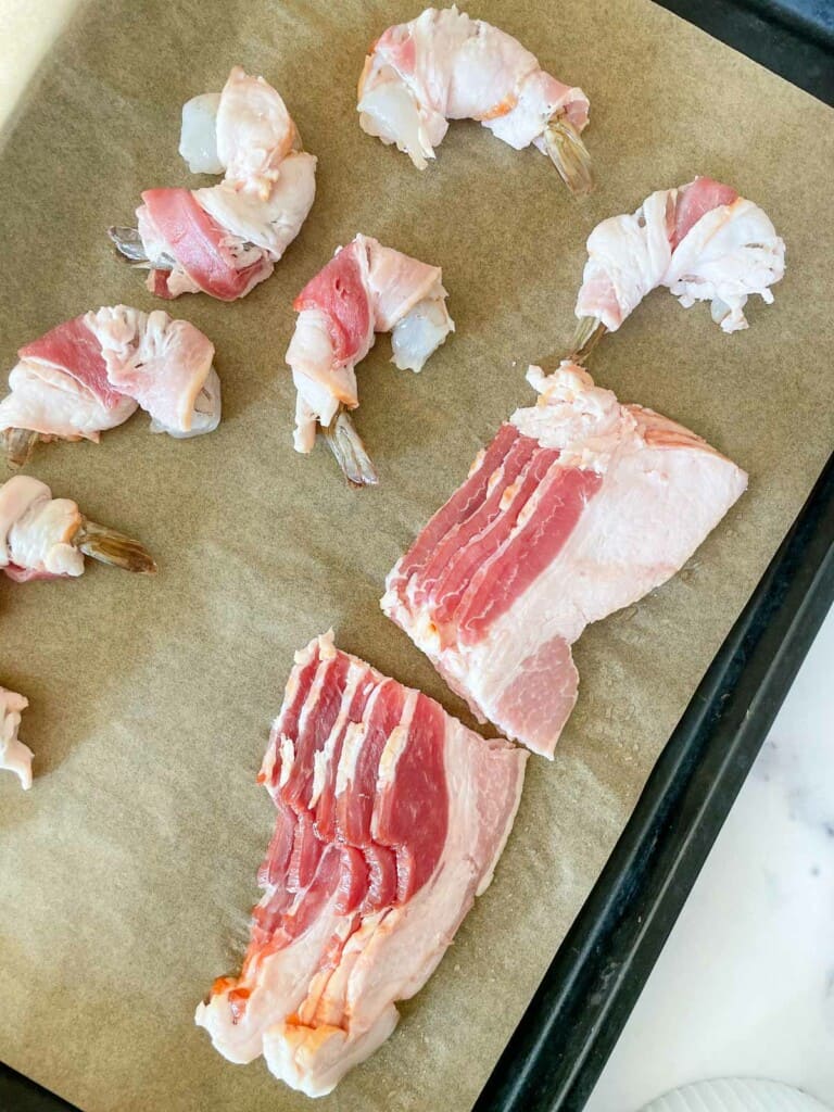 Shrimp and Bacon on a baking sheet.