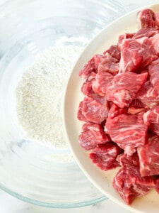 Beef chunks about to be dredged in seasoned flour.