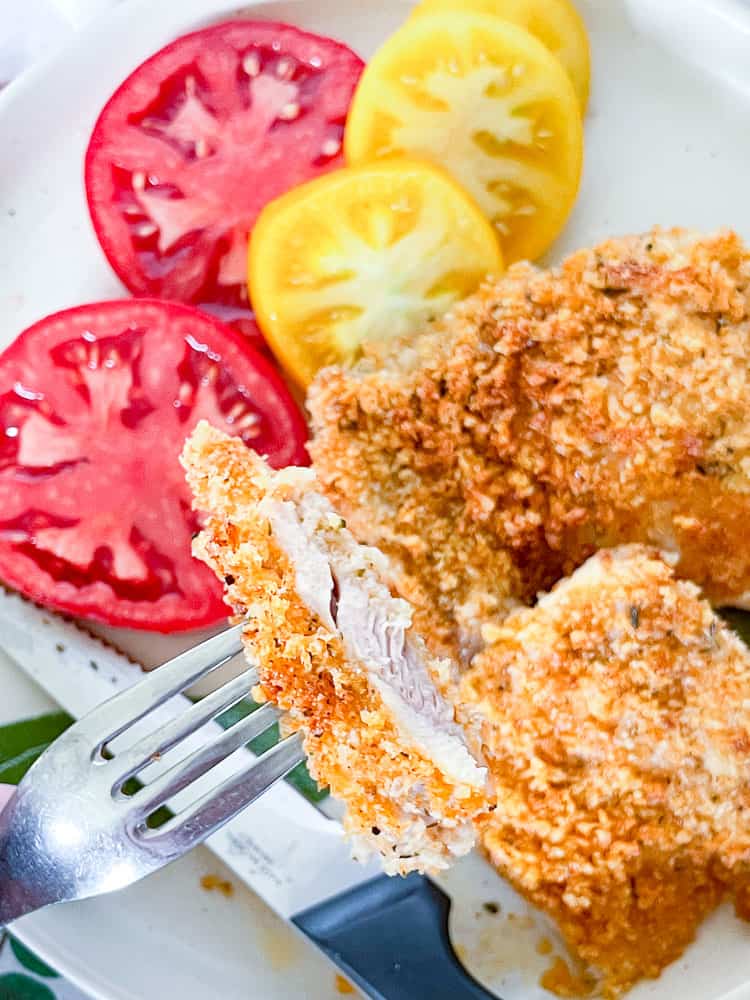A perfect bite of panko fried chicken.