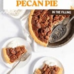 Old Fashioned Bourbon Pecan Pie in a metal pan next to two slices on plates, both topped with whipped cream.
