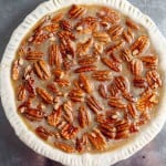 Unbaked bourbon pecan pie in a crust.
