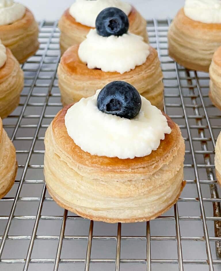 Whipped cream and blueberry filled vol au vent shells.