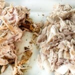 Removing chicken from the bones for chicken and dumplings.