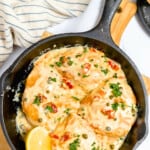 Lemony chicken piccata in a cast iron skillet.