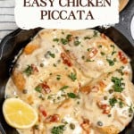 A skillet filled with chicken piccata in creamy sauce, garnished with parsley, capers, diced tomatoes, and a lemon half. Text overlay reads "Easy Chicken Piccata"—a perfect recipe for chicken piccata lovers.