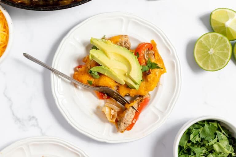 A bite of chicken fajitas casserole on a fork.