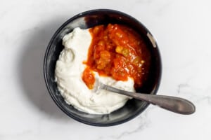 Combine salsa and sour cream.