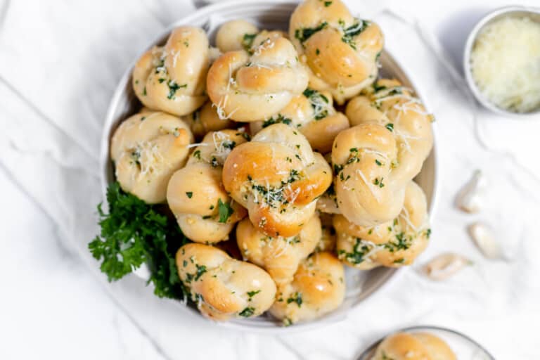 A plate full of garlic knots.