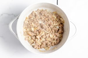 Cooked flour with sausage in a dutch oven.