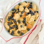 Unbaked blueberry french toast ready to be refrigerated.