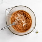 Added cocoa powder and flour to the butter mixture.