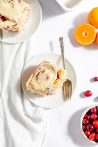 Top view of the best homemade orange rolls with cranberry sauce.