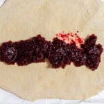 Cranberry filing to be spread on a the sweet roll dough.