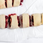 Sliced sweet rolls ready to go in a prepared pan.