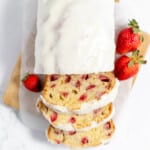 A strawberry quick bread iced with lemony icing.