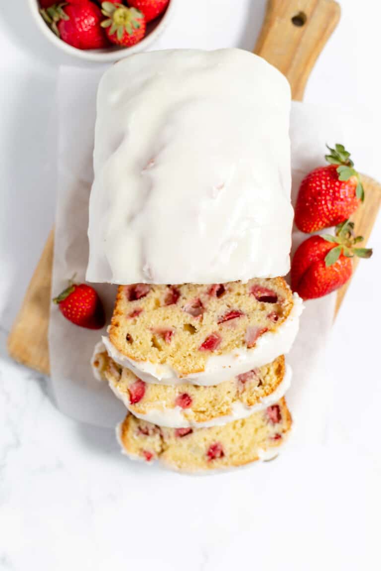 A strawberry quick bread iced with lemony icing.