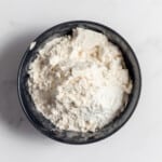 Flour, salt and baking powder in a bowl.