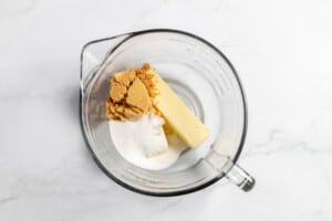 Butter and sugar in a bowl.