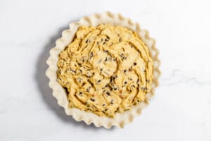 Chocolate chip cookie dough in a pie shell.