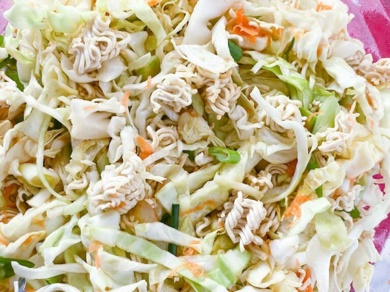 A bowl of crunchy ramen noodle salad.