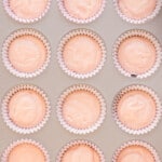 Cupcake batter in a muffin tin.