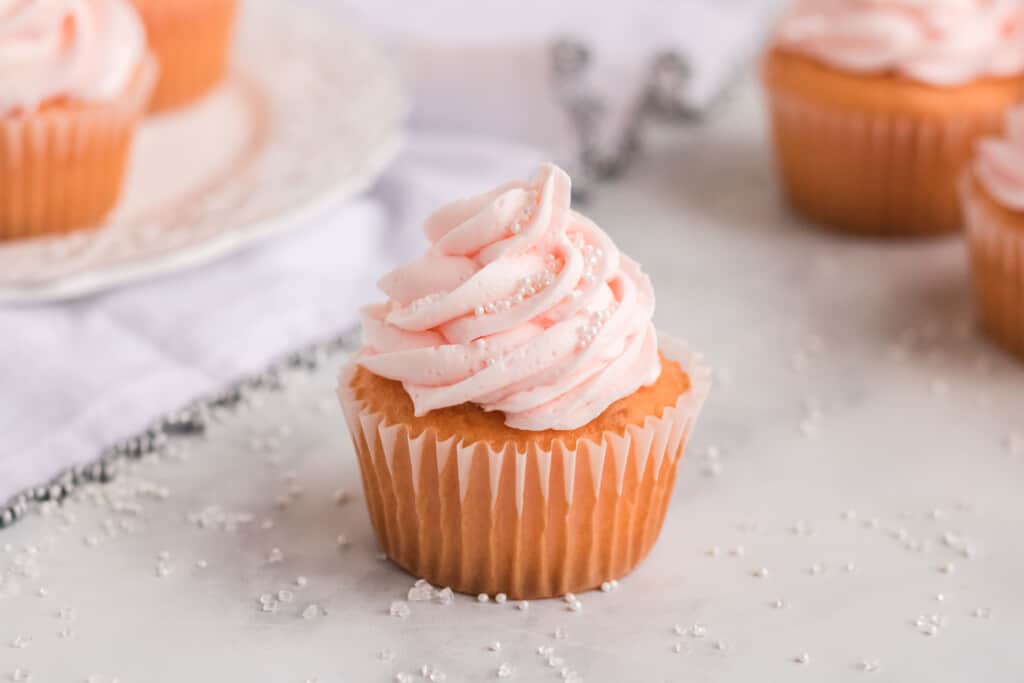 A cupcake with sprinkles.