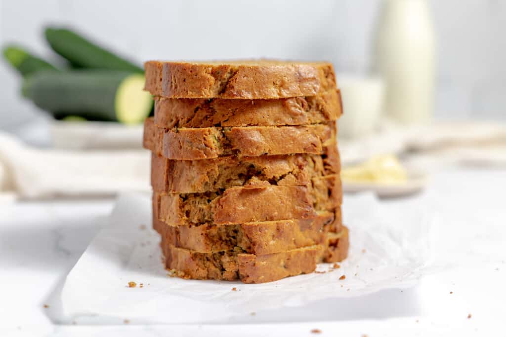 Stacked slices of zucchini banana bread. 