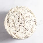 Finished filled and frosted cannoli cake.