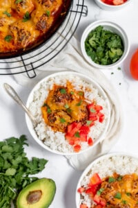 A bowl of enchilada meatballs with vegetables.