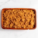 A pumpkin zucchini bread with a crumble topping.