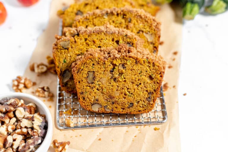 Zucchini bread with walnuts on a cooling rack, made with pumpkin.