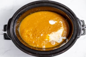 A bowl of soup in a slow cooker.