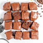 Chocolate zucchini brownies on a white plate.