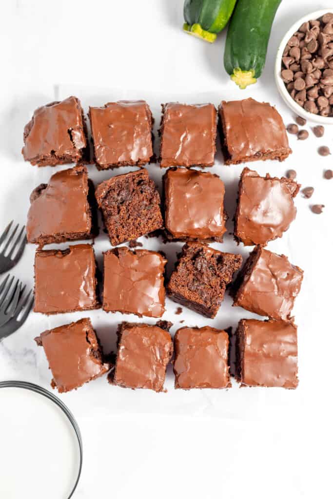 Chocolate zucchini brownies on a white plate.