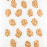 Crock Pot Nut cluster candy on a baking sheet.
