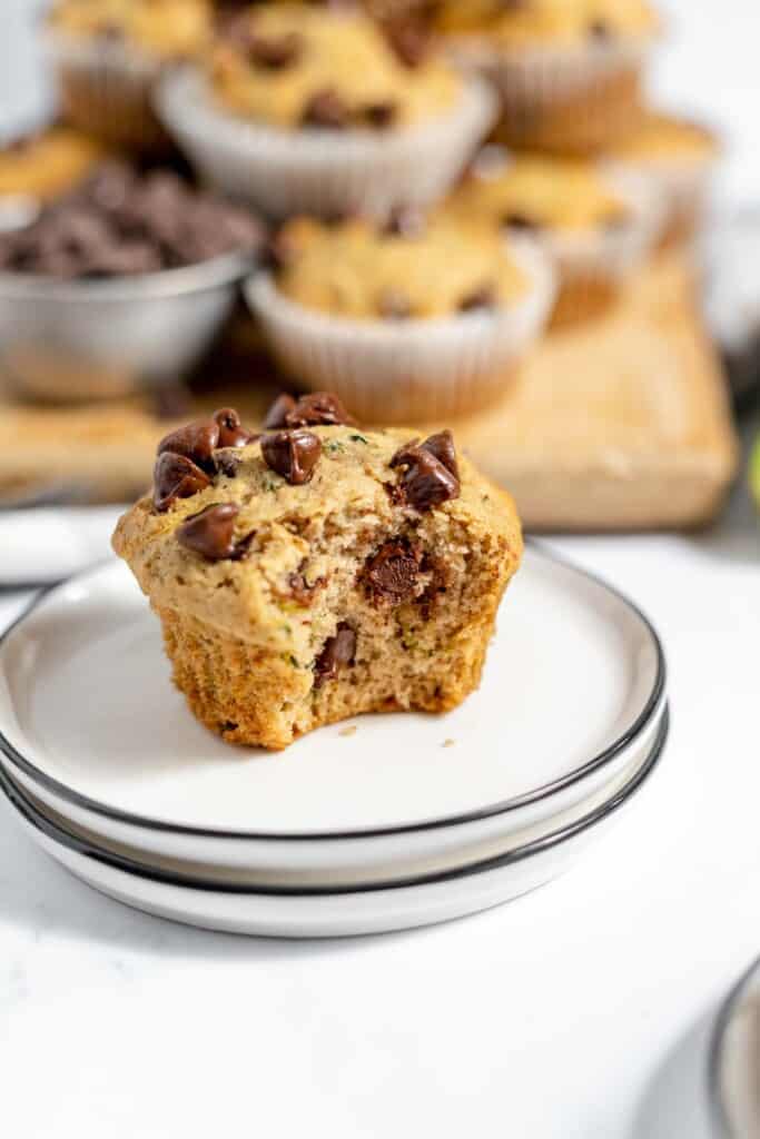 A muffin with a bite out of it. 