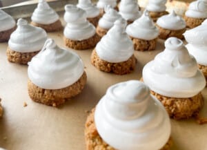 A tray of mallowmars with meringue on top.