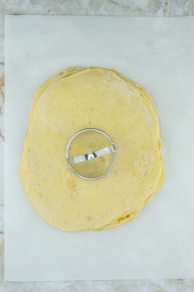 A piece of dough with a ring on top of it.